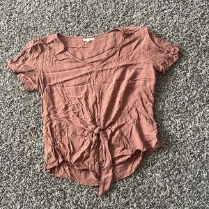 Blush, tie blouse from Maurice’s